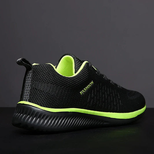 Lightweight black and neon green walking sneakers for men with breathable mesh design