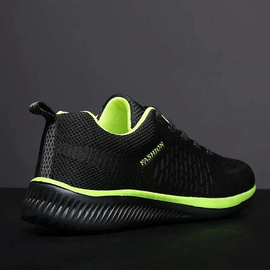 Lightweight black and neon green walking sneakers for men with breathable mesh design
