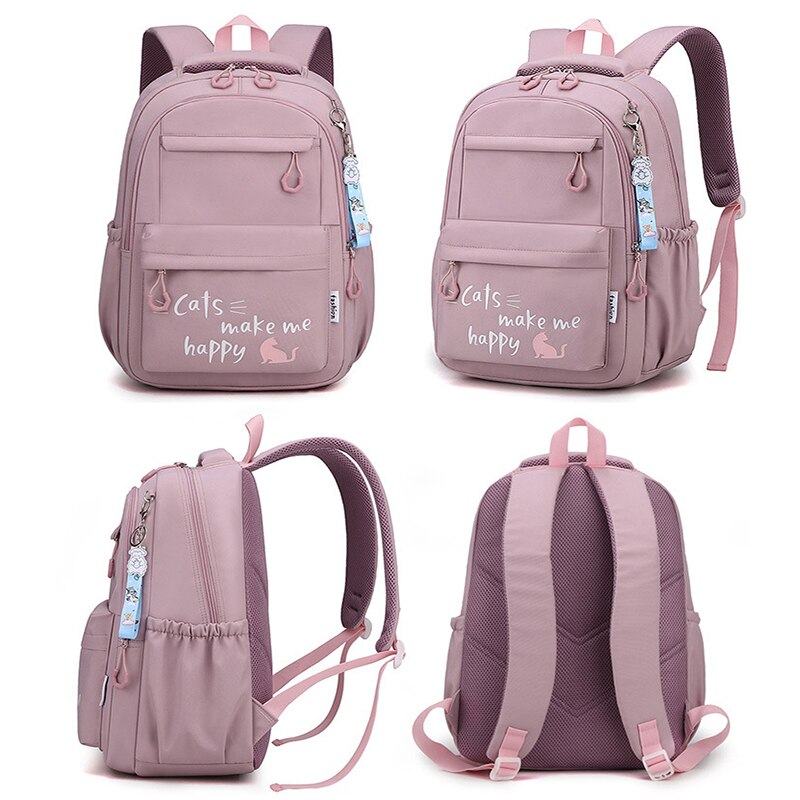 Waterproof teens college backpack in pink with cat print, multiple compartments, padded straps, and portability features
