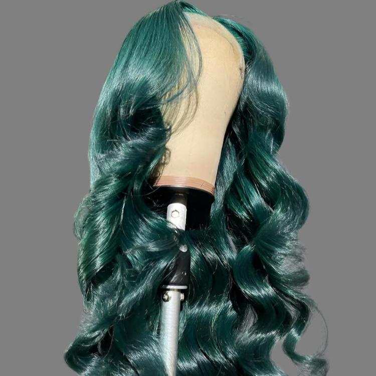 13x4 transparent lace frontal human hair wig with green loose curls on mannequin head