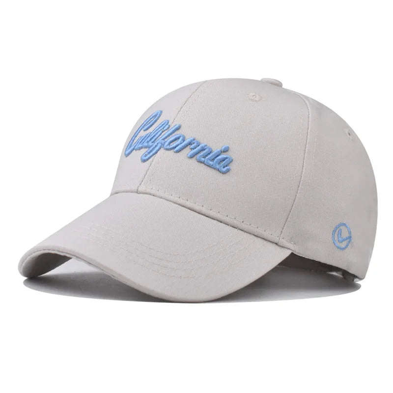 Light gray women's summer baseball cap with blue "California" embroidery and curved brim