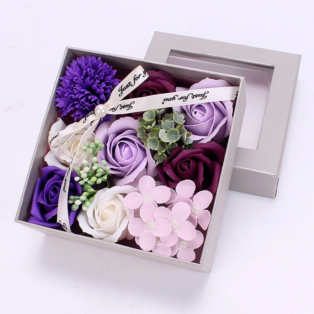 Valentine's Day holding flower gift box with purple, white, and pink artificial flowers and ribbon decoration