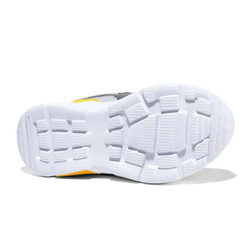 Sole view of breathable outdoor kids shoes lightweight sneakers with durable tread pattern
