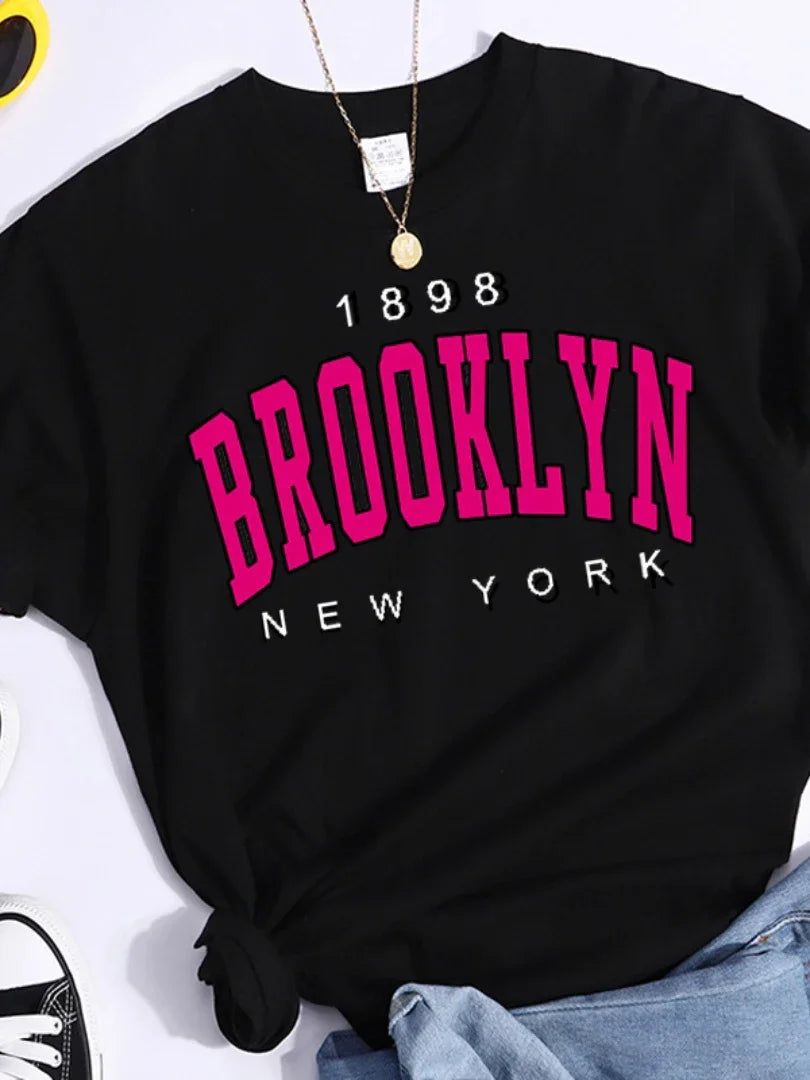 Black Women's Brooklyn New York T Shirt with pink and white print and knot detail