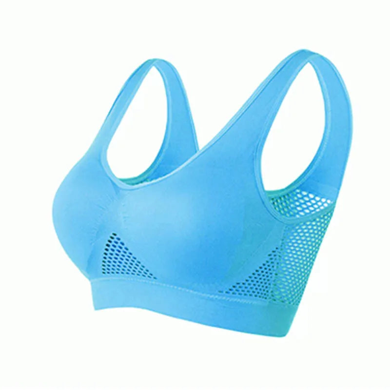 Women's breathable sports bra in light blue with mesh panels for ventilation and comfort during workouts