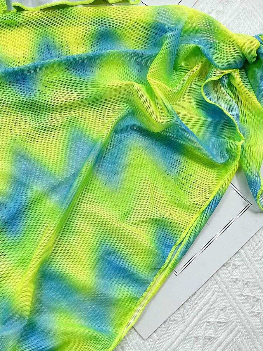 Close-up of vibrant tie-dye fabric in green and blue from Women's 3Pieces Tie Dye Swimsuits