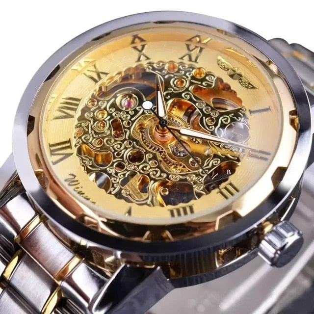 Men's skeleton mechanical luxury watch with gold intricate dial and stainless steel band