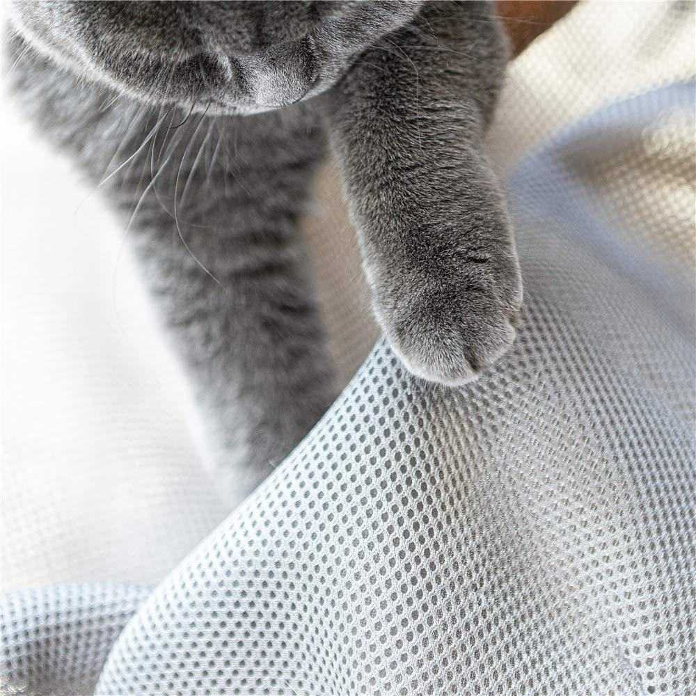 Gray cat paw on breathable mesh fabric of cat iron breathable hammock bed