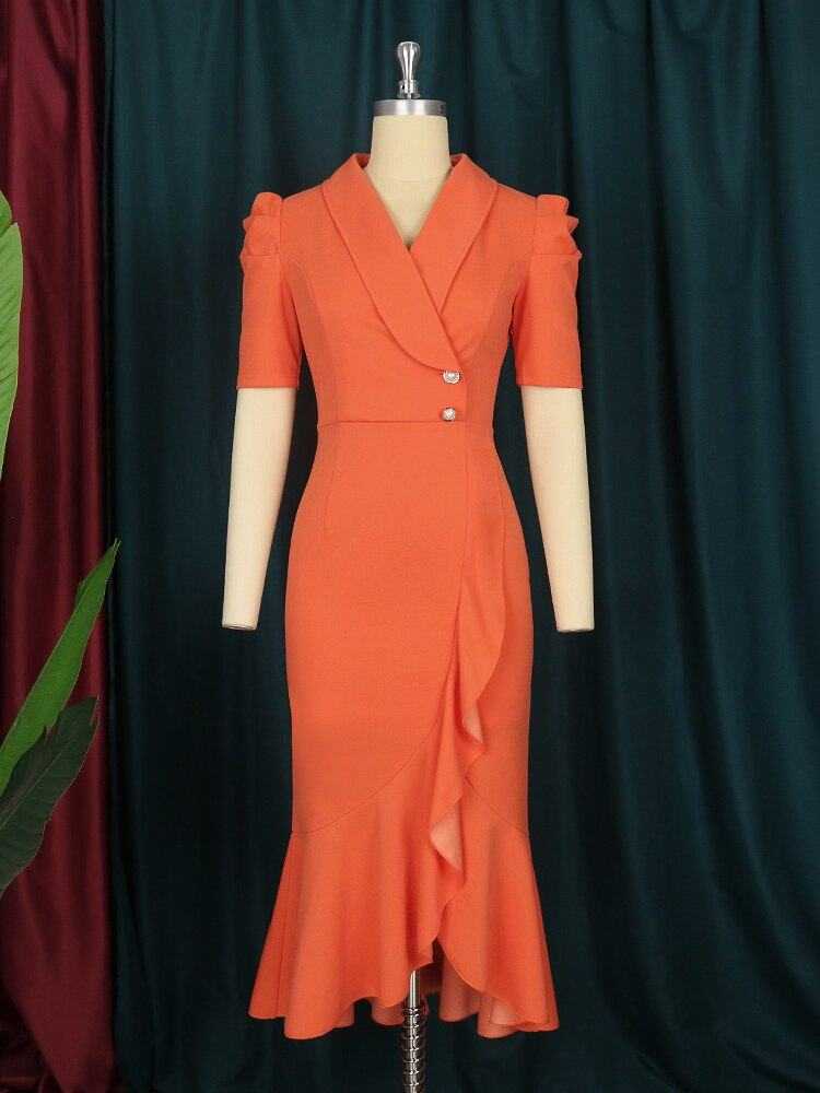 Elegant orange slim fit mermaid midi dress with notched lapel and ruffle hem on mannequin