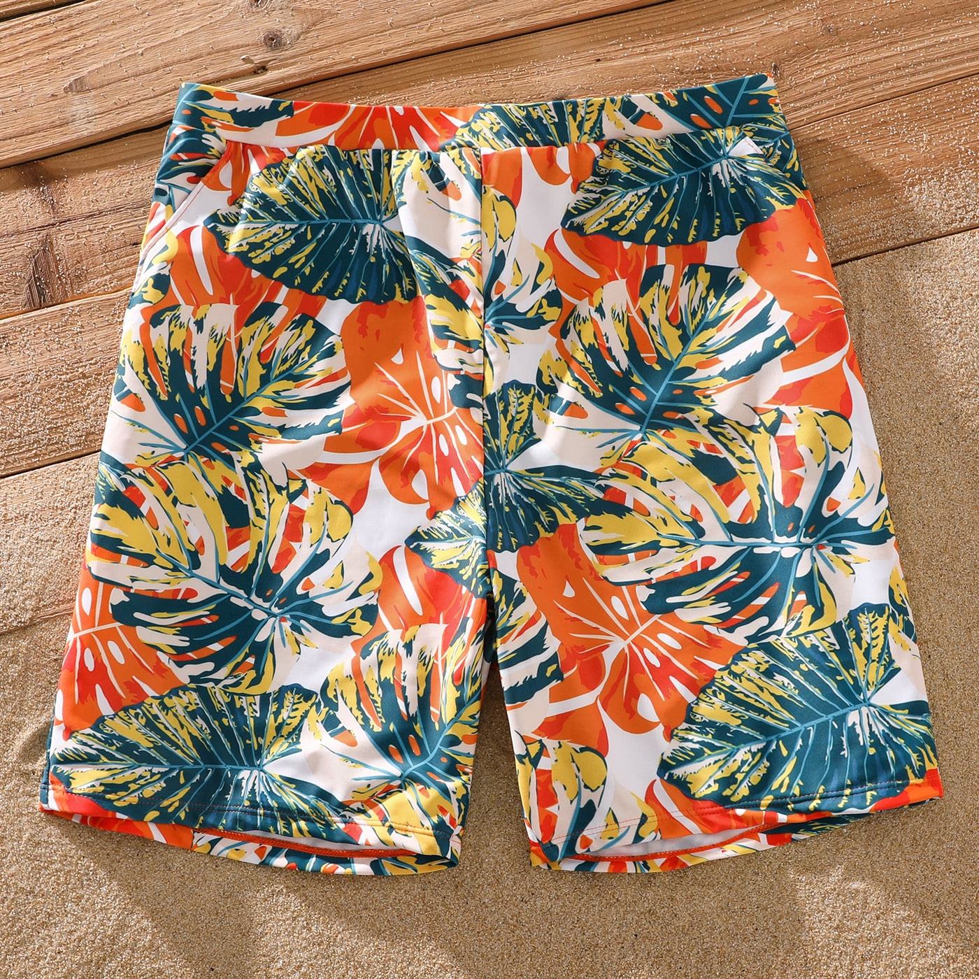 Men's tropical print swim trunks shorts, family matching swimsuit set, vibrant orange and green leaf pattern
