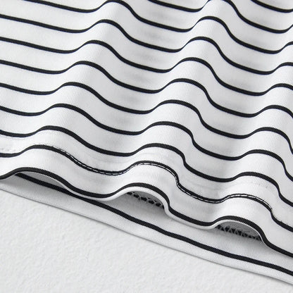 Close-up of white and black striped fabric from children's 3 pieces set summer tank top