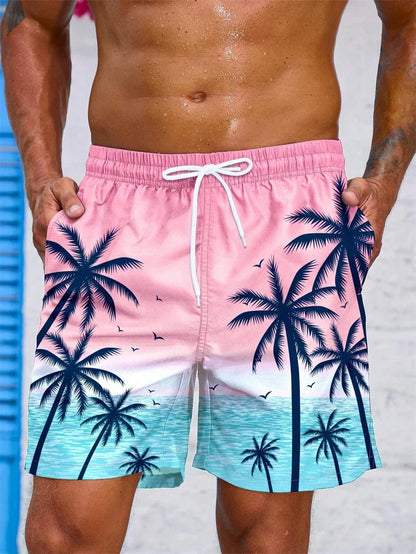 Men's summer swim trunks with pink and blue tropical palm tree design and white drawstring waistband