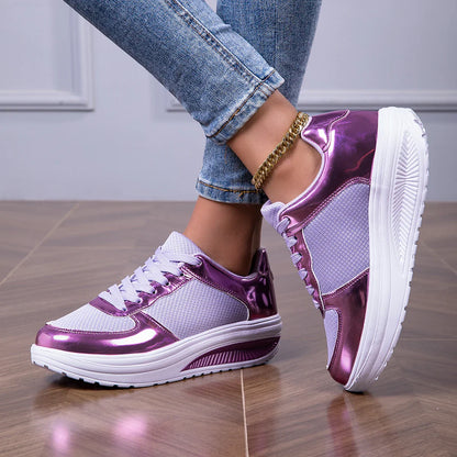 Women's walking shoes purple metallic sneakers with white soles and mesh design worn with jeans